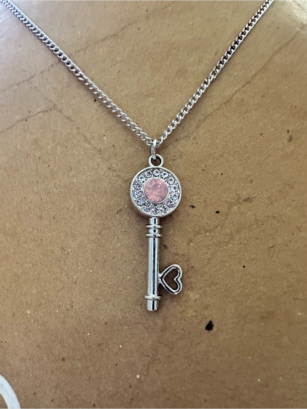 Silver Key Pendant Necklace with Pink Crystal Accent